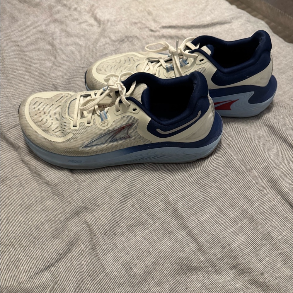 White and Blue Altra Paradigms worn